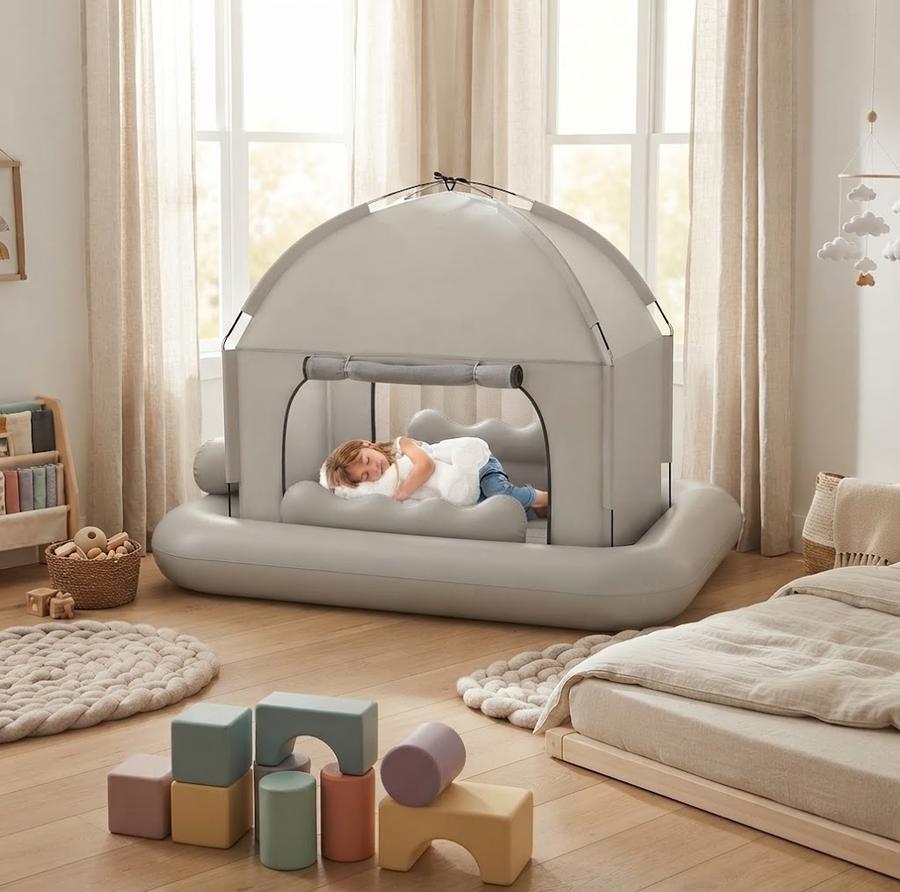 Whiffee inflatable travel bed with its mesh tent zipped over